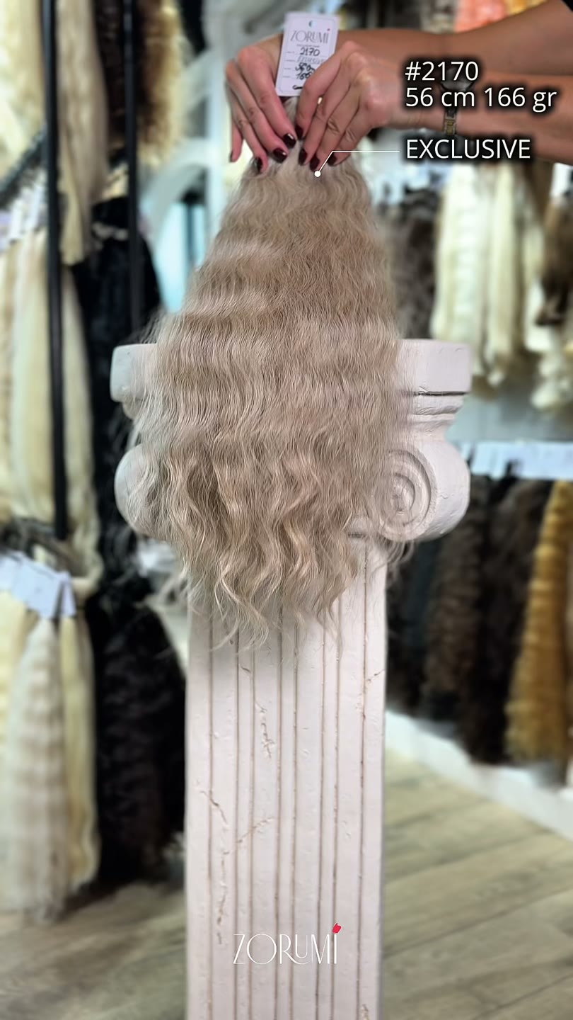 Natural hair package from the current ZORUMI collection, filmed in daylight. Length, weight and shade are confirmed in writing, not from the clip.