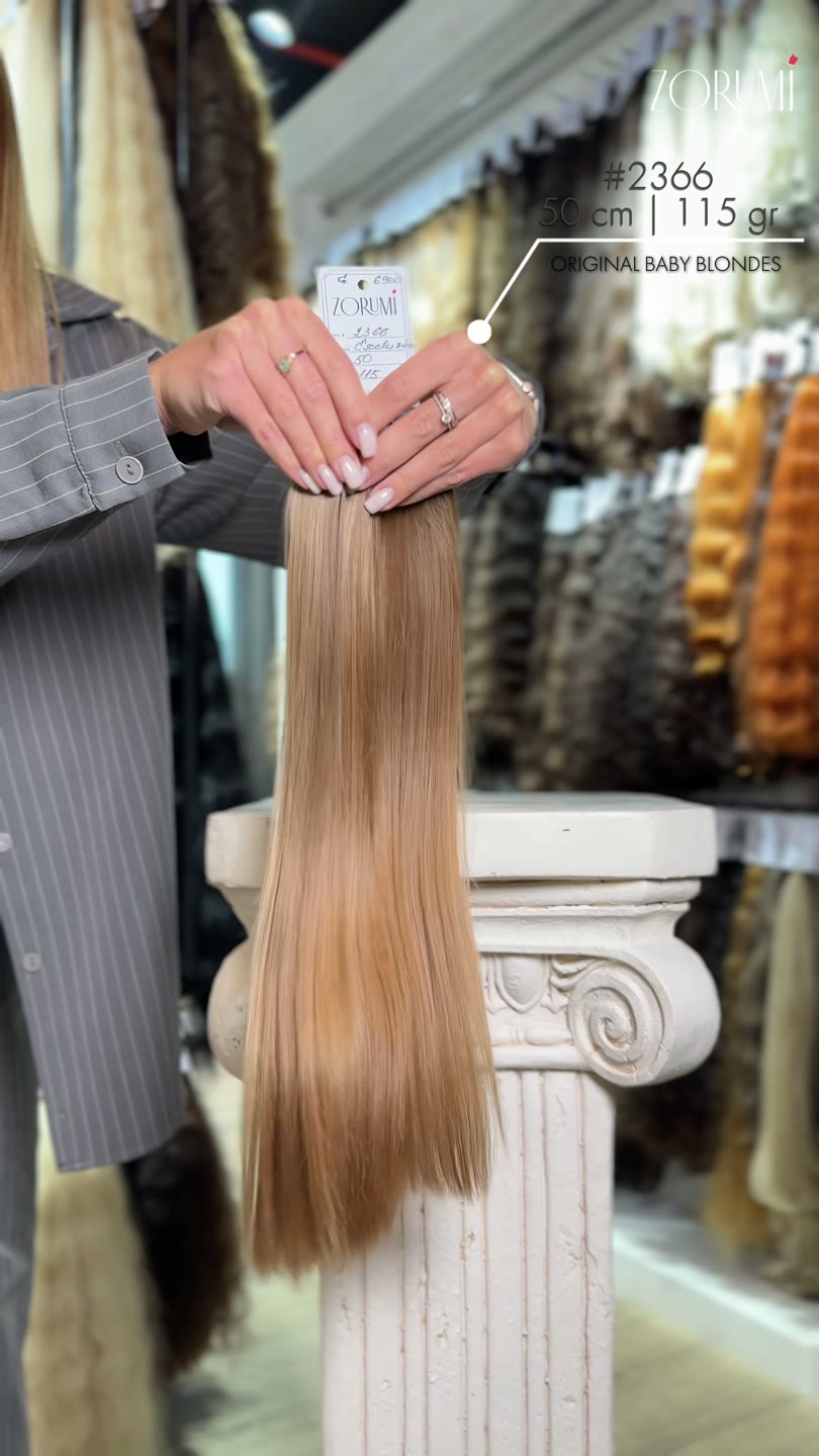 Natural hair package from the current ZORUMI collection, filmed in daylight. Length, weight and shade are confirmed in writing, not from the clip.