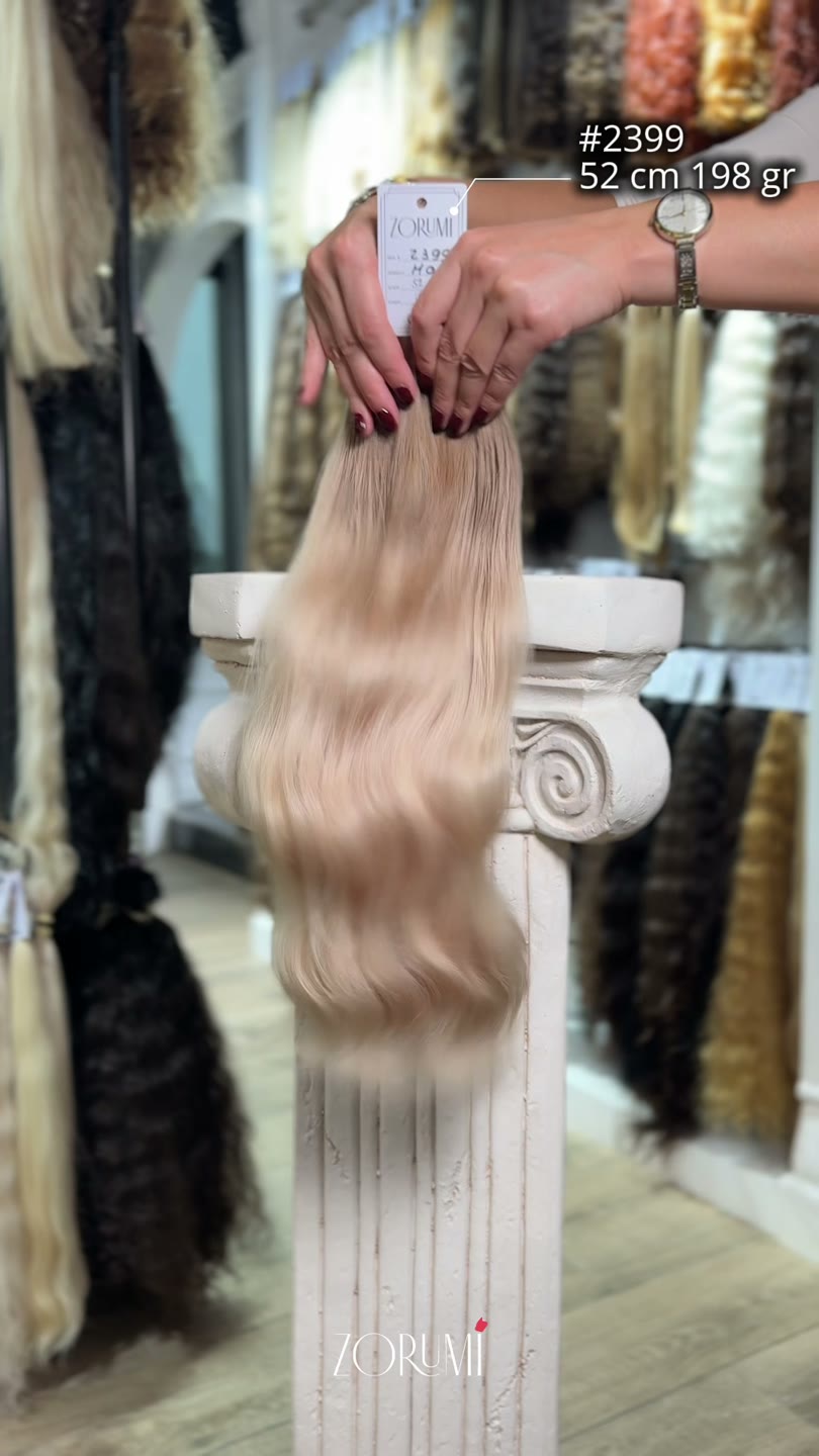 Natural hair package from the current ZORUMI collection, filmed in daylight. Length, weight and shade are confirmed in writing, not from the clip.