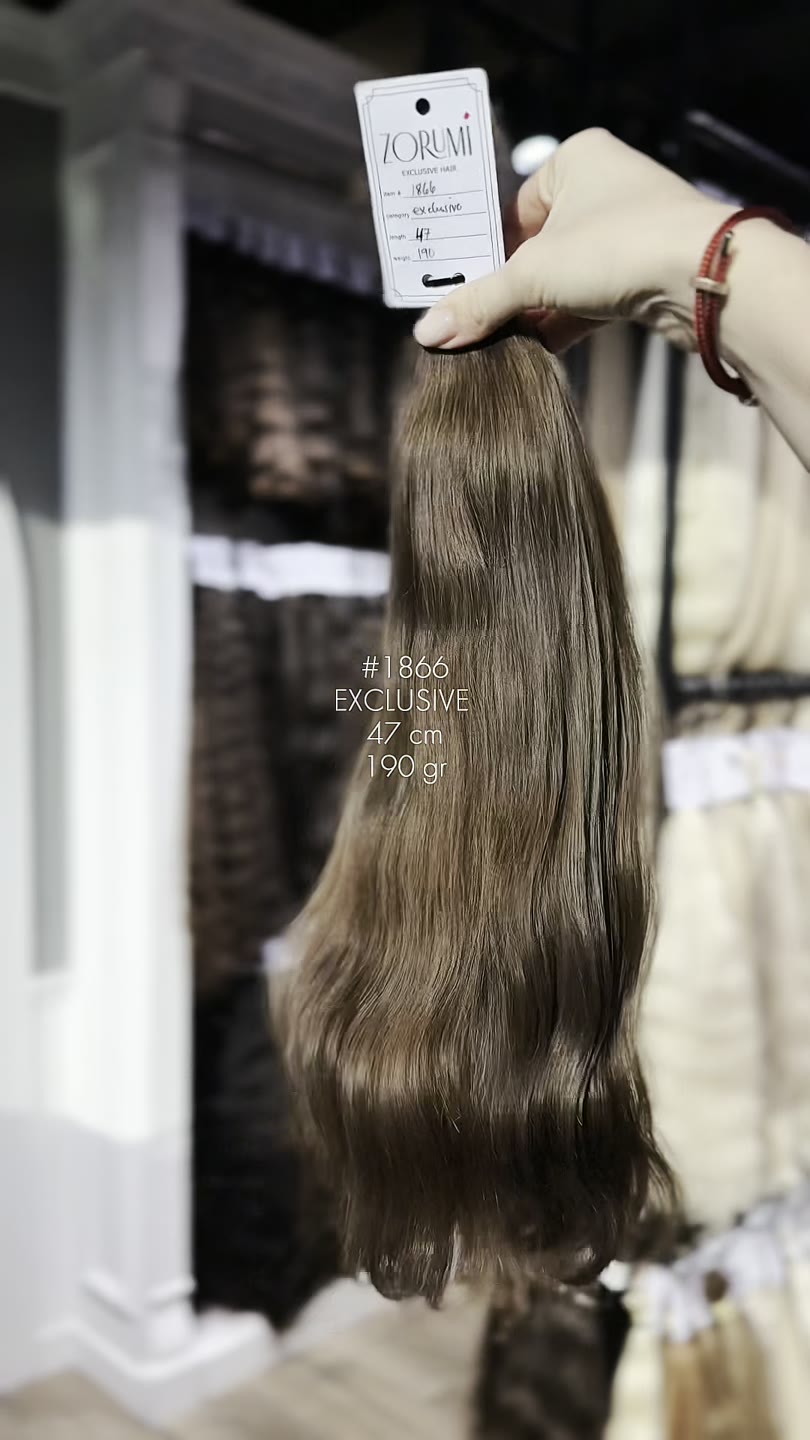 Natural hair package from the current ZORUMI collection, filmed in daylight. Length, weight and shade are confirmed in writing, not from the clip.