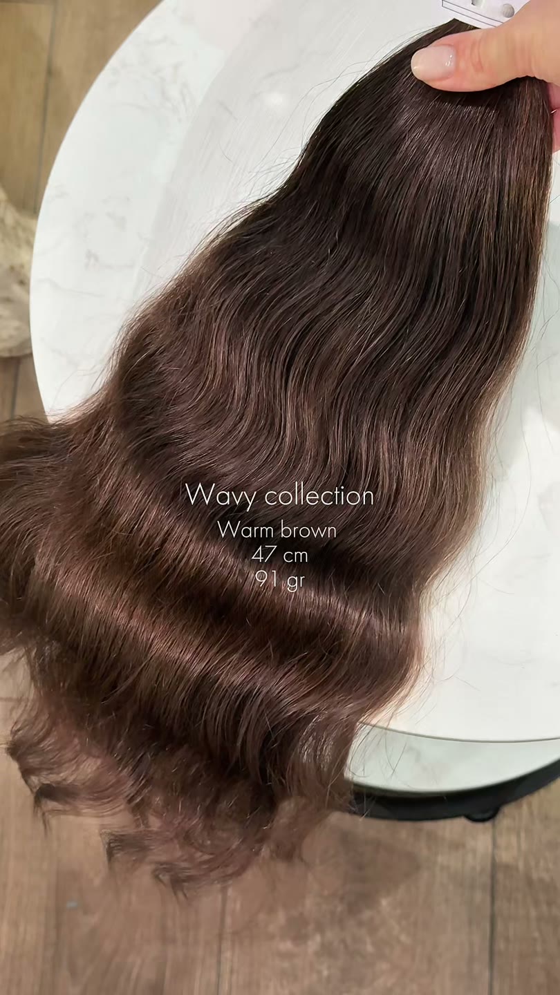 Natural hair package from the current ZORUMI collection, filmed in daylight. Length, weight and shade are confirmed in writing, not from the clip.