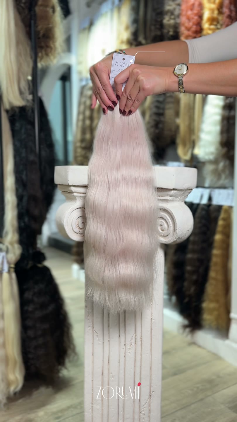 Natural hair package from the current ZORUMI collection, filmed in daylight. Length, weight and shade are confirmed in writing, not from the clip.
