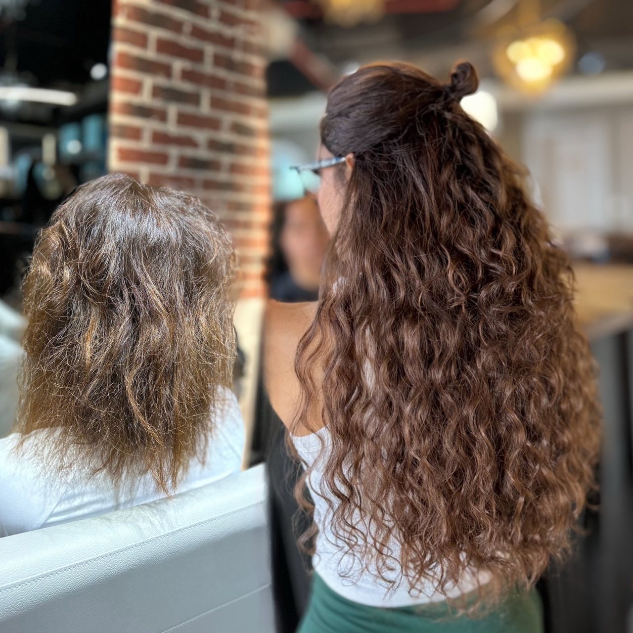 Long natural hair extension result at ZORUMI™