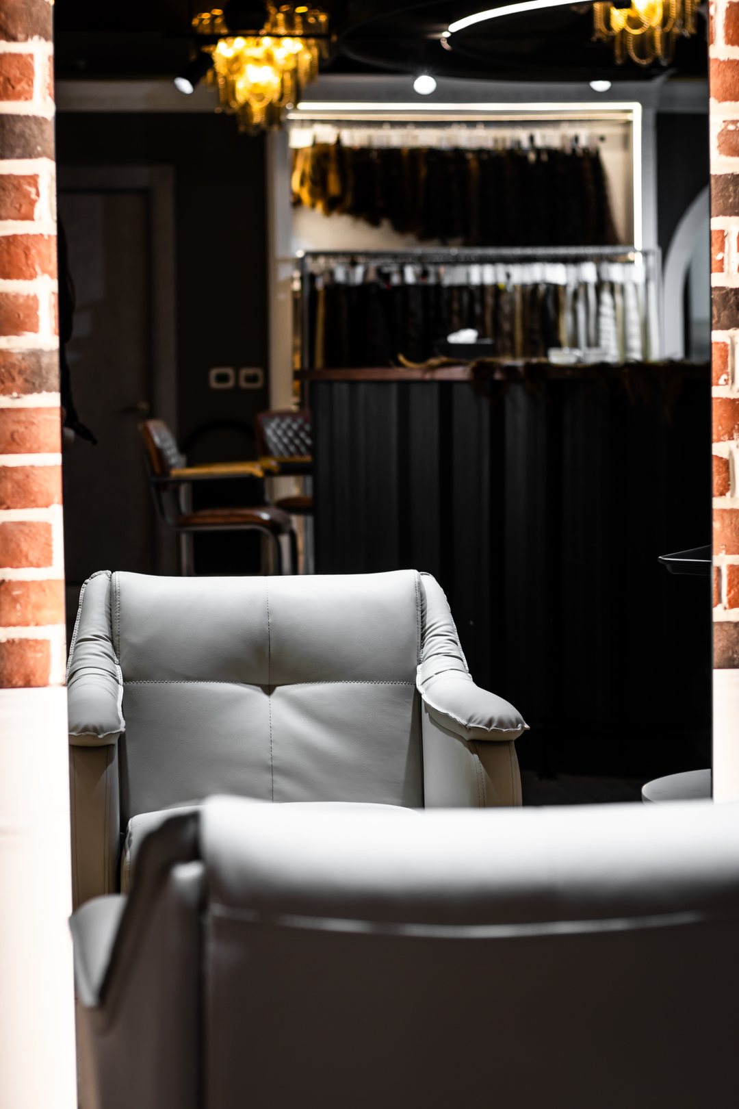 Interior with chair and hair wall