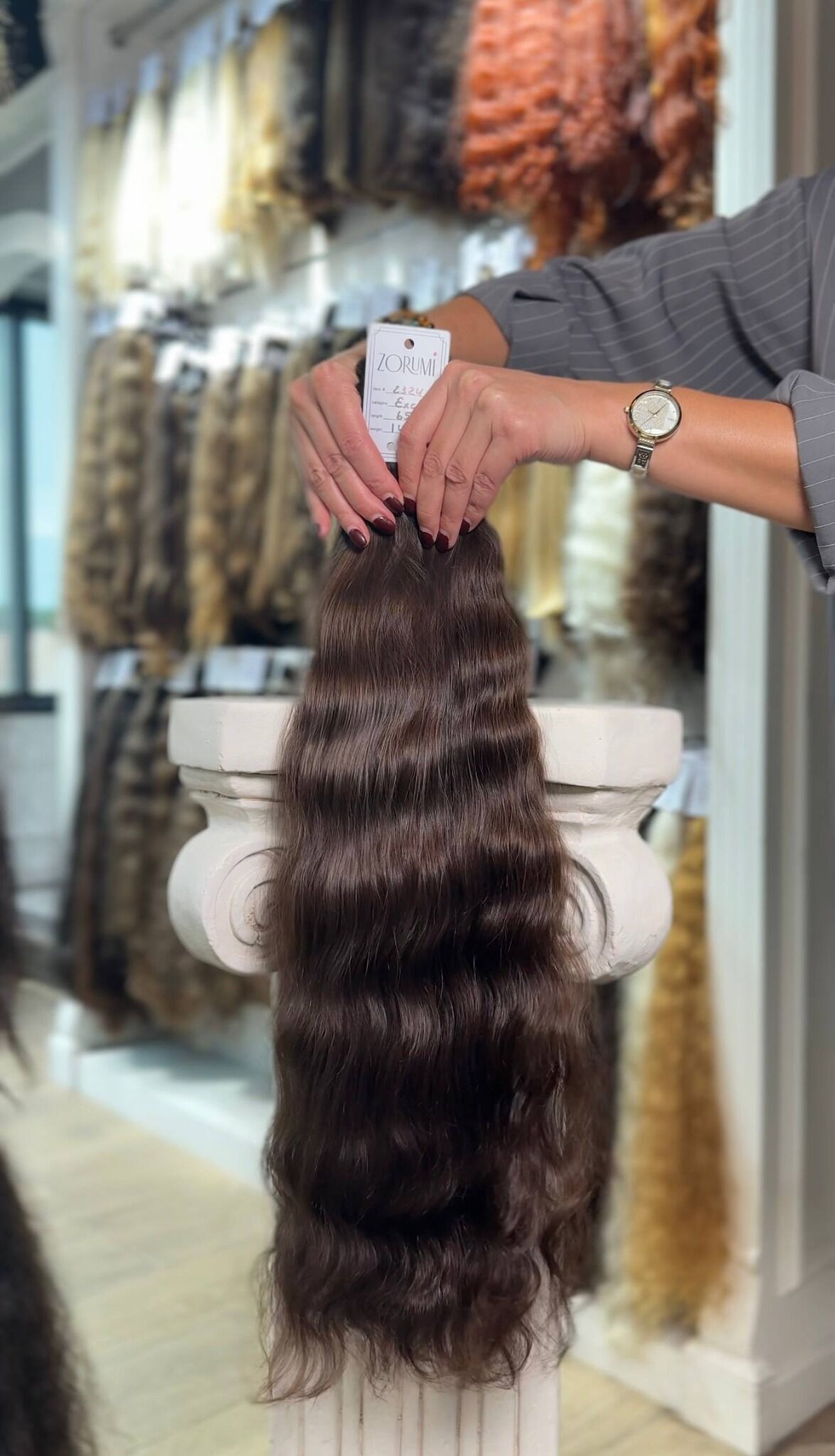 Dark brown donor hair ponytail with a pronounced natural wave