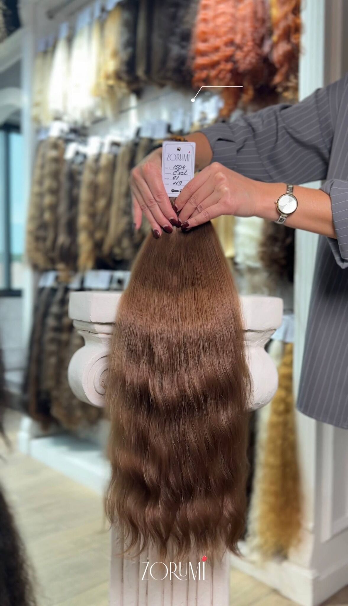 Warm brown naturally wavy donor hair ponytail at ZORUMI