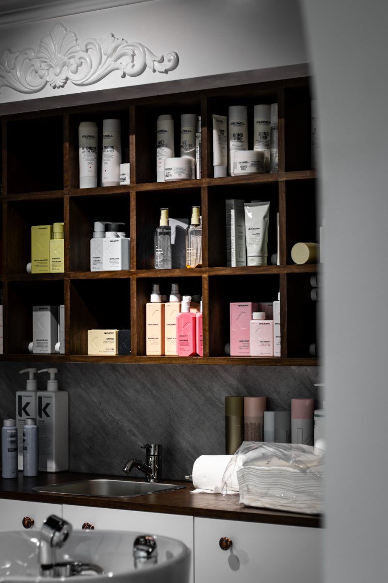 Professional hair care products on the shelves at ZORUMI Dubai.