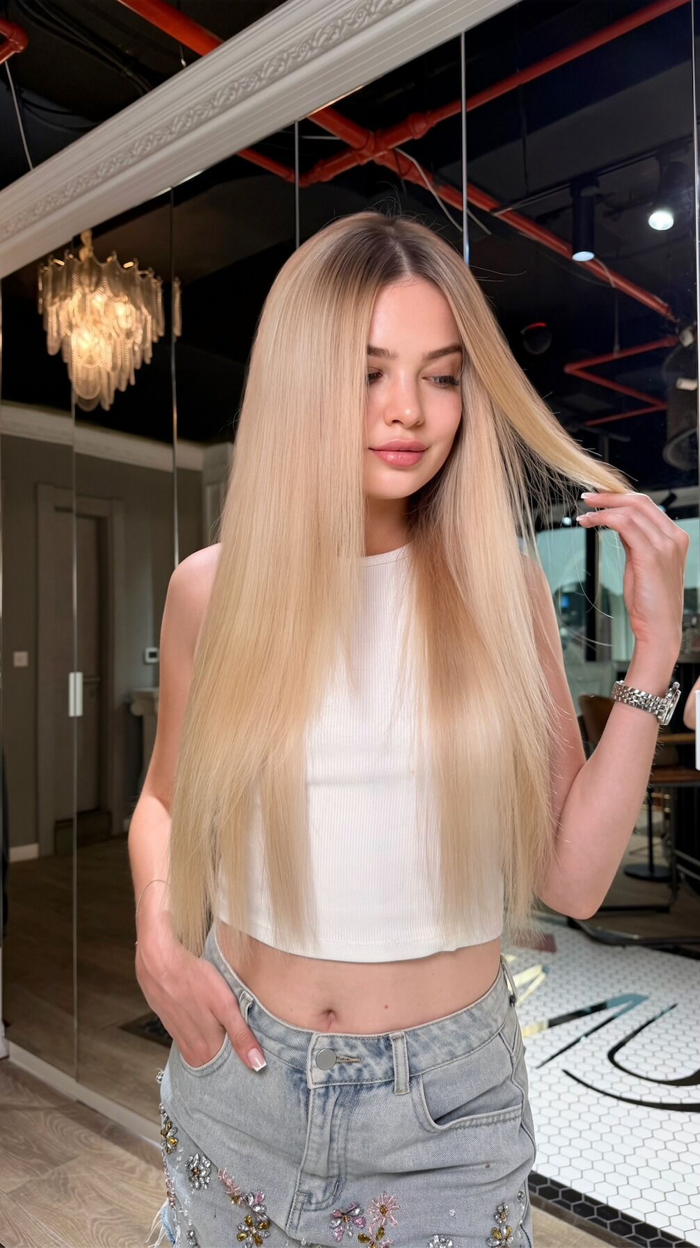 Featured ZORUMI guest after her salon hair transformation with smooth long blonde hair