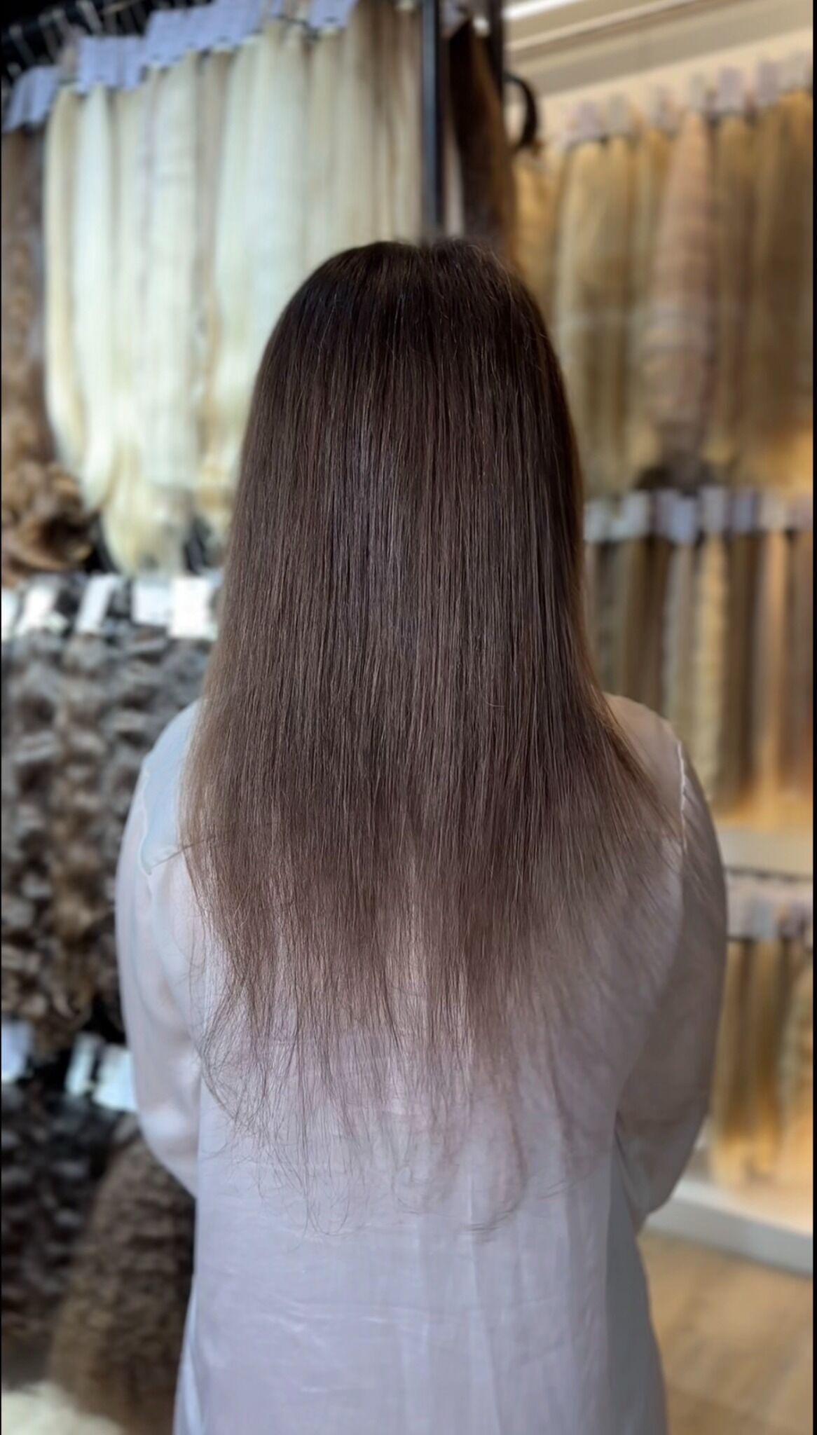 Long straight dark hair result at ZORUMI Dubai, back view